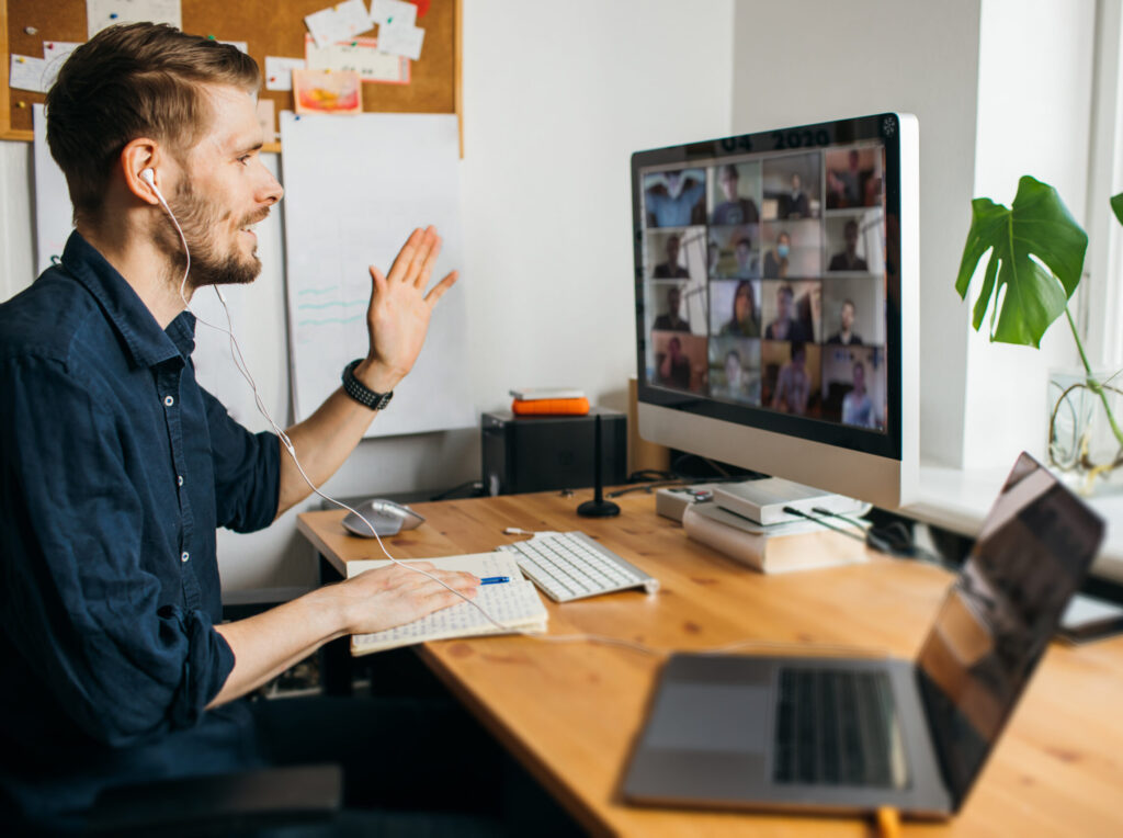 Business,video,conferencing.,young,man,having,video,call,via,computer